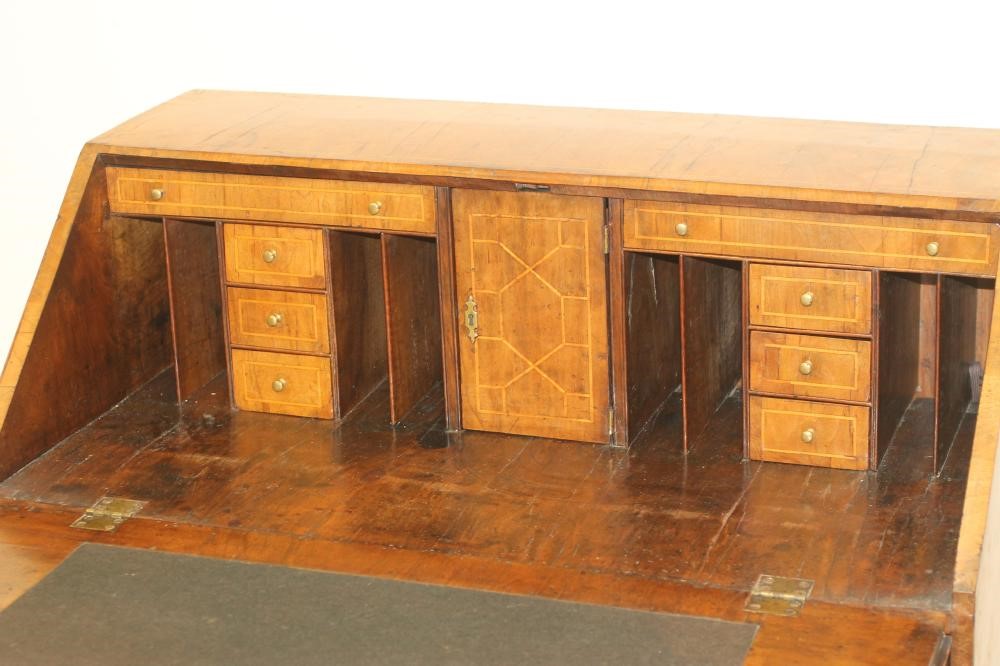 A GEORGIAN WALNUT BUREAU Image