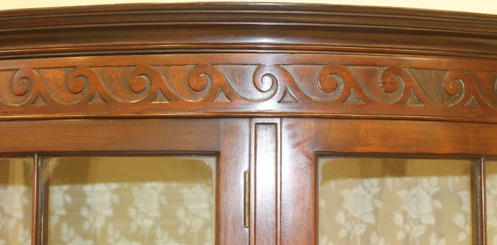 A MAHOGANY DISPLAY CABINET Image