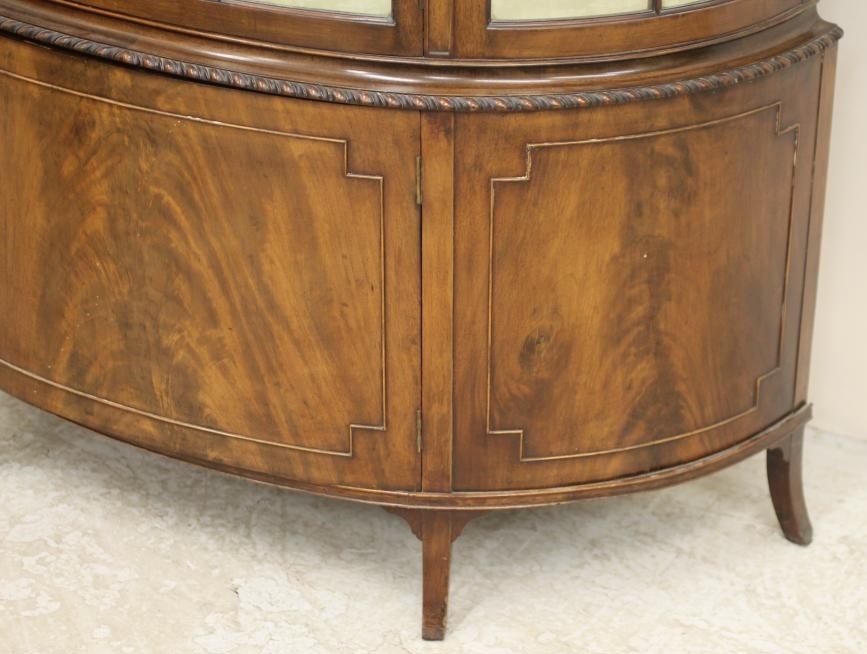 A MAHOGANY DISPLAY CABINET Image