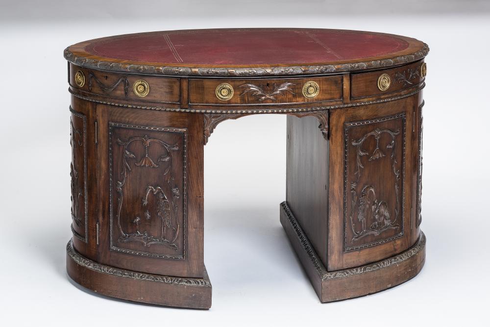 A GEORGIAN STYLE OVAL MAHOGANY PARTNER'S DESK Image