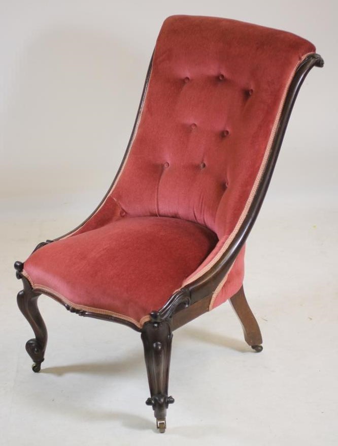 A VICTORIAN ROSEWOOD FRAMED NURSING CHAIR of Grecian design Image