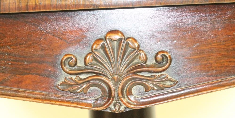 A WILLIAM IV ROSEWOOD FOLDING CARD TABLE of rounded oblong form Image