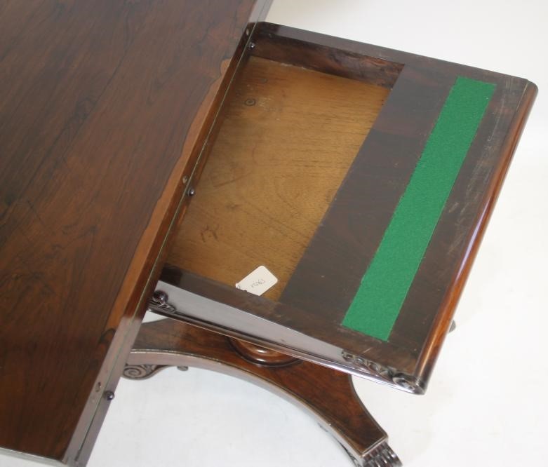 A WILLIAM IV ROSEWOOD FOLDING CARD TABLE of rounded oblong form Image