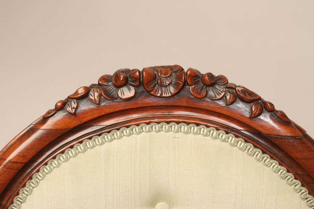 A VICTORIAN WALNUT FRAMED SALON CHAIR button upholstered in pale green watered silk Image