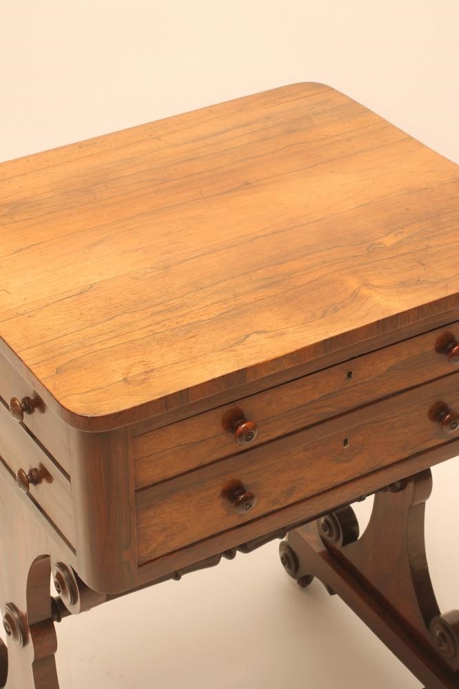 A LADY'S REGENCY ROSEWOOD SMALL SECRETAIRE of rounded oblong form Image