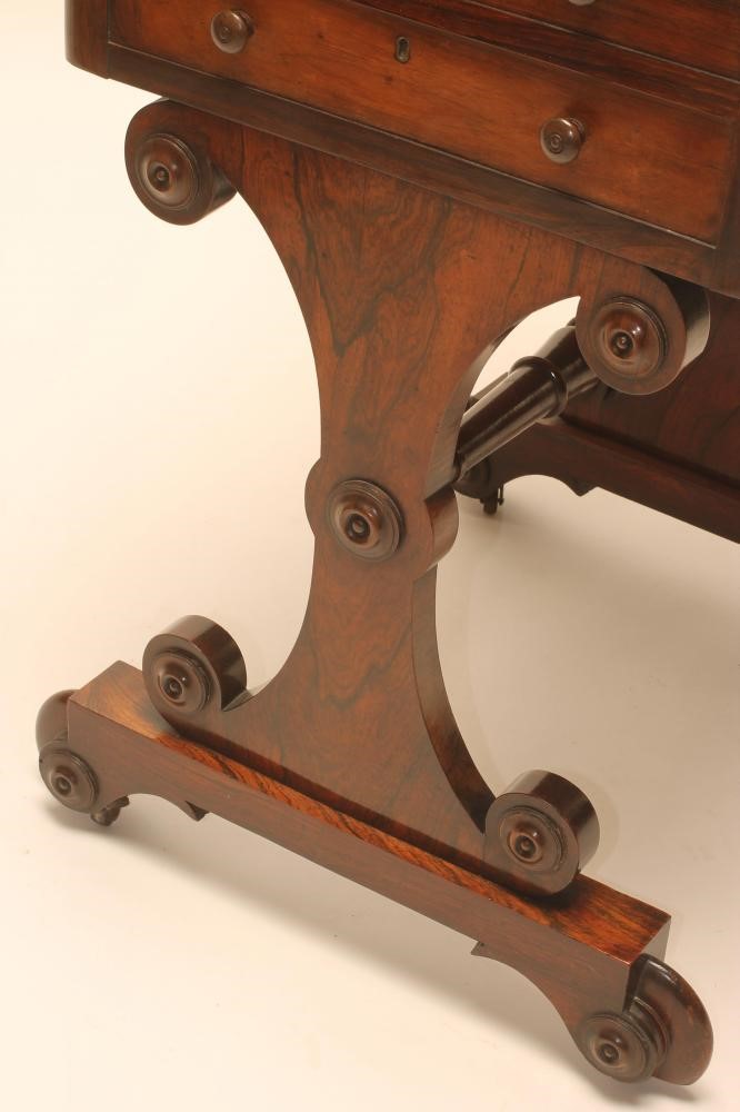 A LADY'S REGENCY ROSEWOOD SMALL SECRETAIRE of rounded oblong form Image