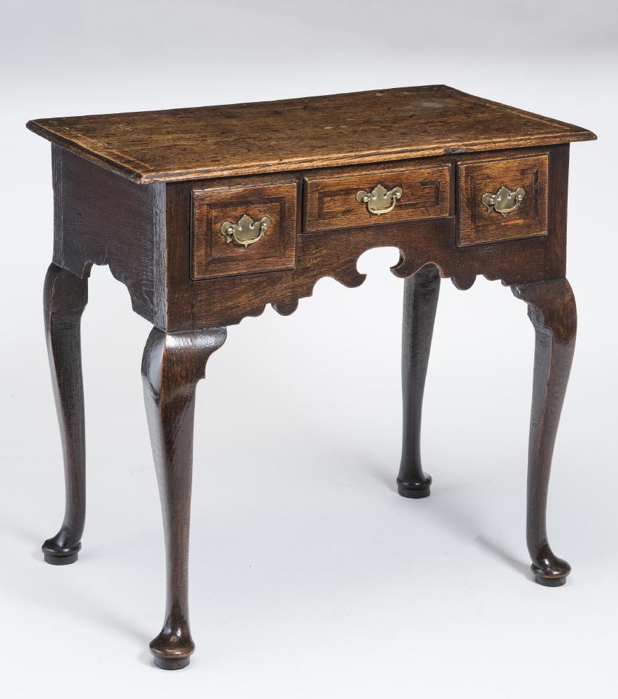 A GEORGIAN OAK AND MAHOGANY BANDED LOW BOY Image