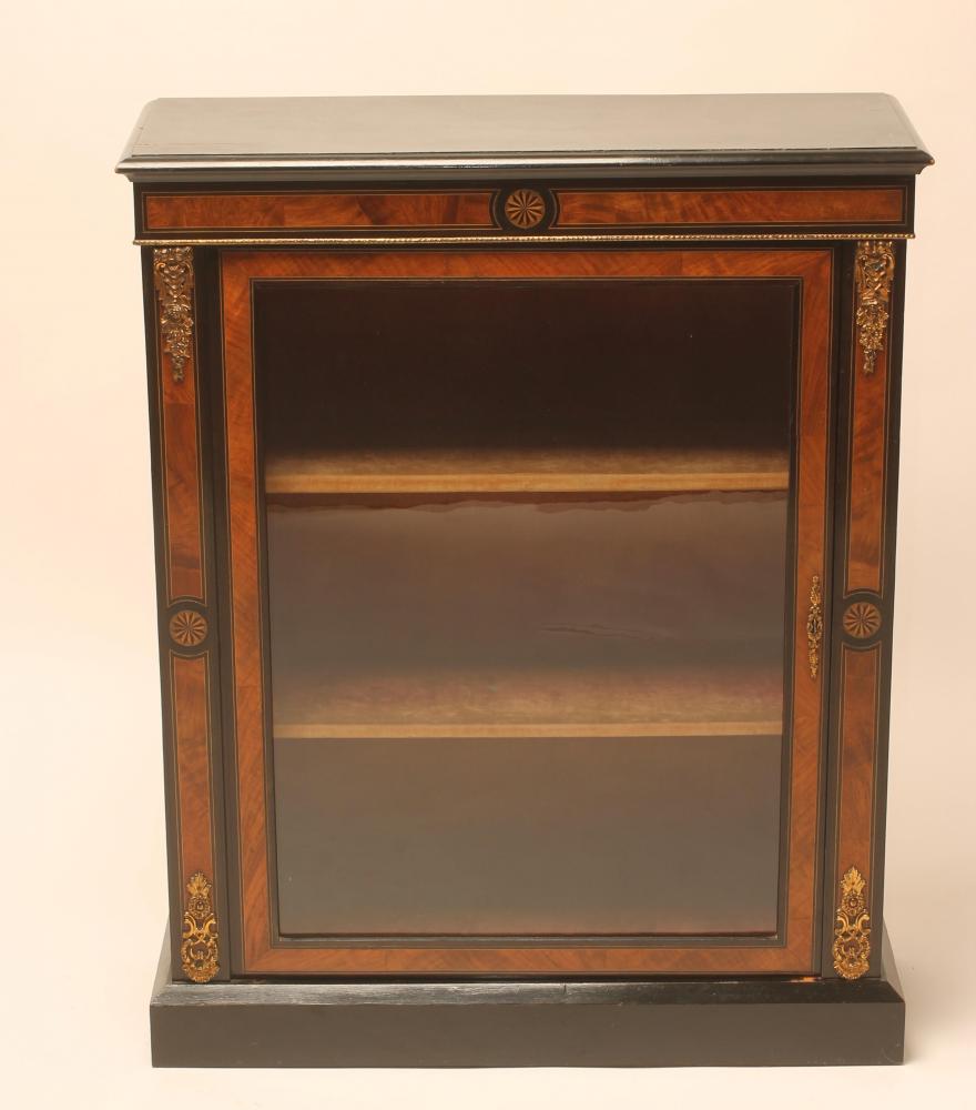 A VICTORIAN EBONISED AND WALNUT PIER DISPLAY CABINET with inlaid roundels and gilt metal mounts Image