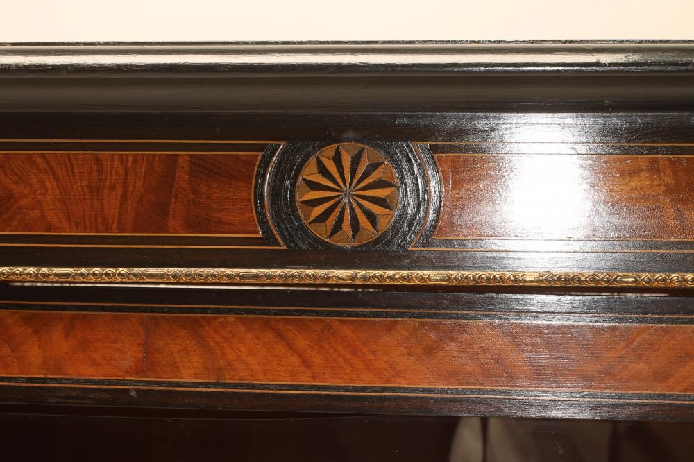 A VICTORIAN EBONISED AND WALNUT PIER DISPLAY CABINET with inlaid roundels and gilt metal mounts Image
