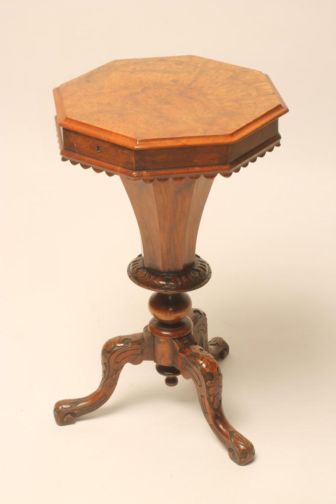 A VICTORIAN WALNUT SEWING TABLE of octagonal form Image