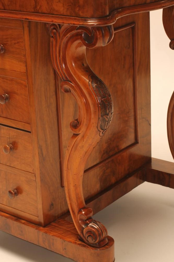 A VICTORIAN WALNUT DAVENPORT Image