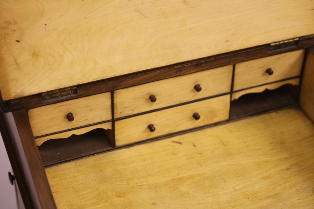 A VICTORIAN WALNUT DAVENPORT Image