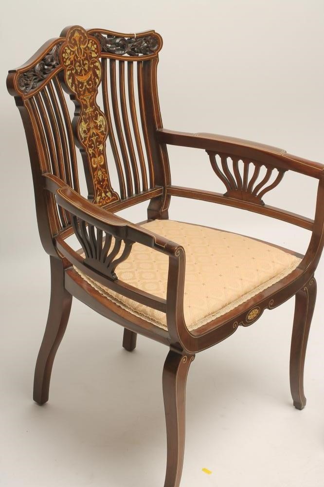 AN EDWARDIAN MAHOGANY AND INLAID ELBOW CHAIR Image