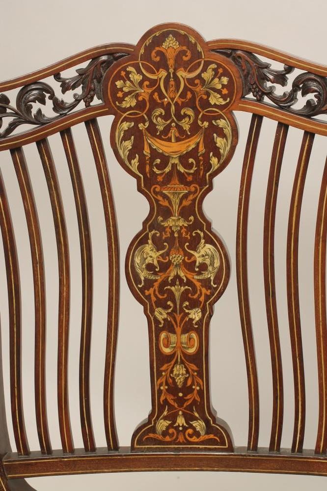 AN EDWARDIAN MAHOGANY AND INLAID ELBOW CHAIR Image