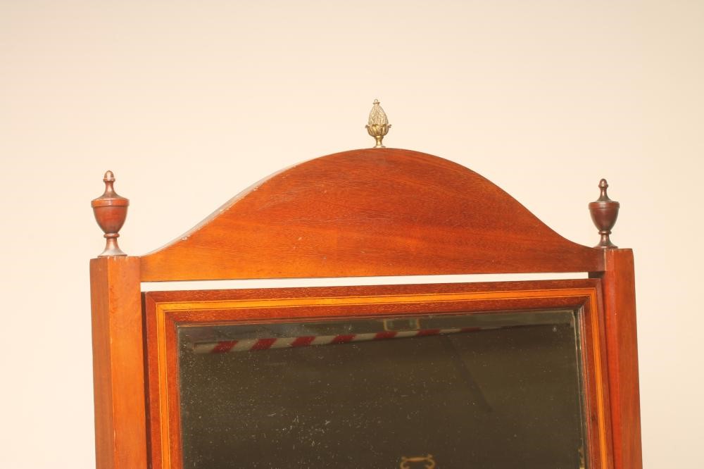 AN EDWARDIAN MAHOGANY CHEVAL MIRROR Image