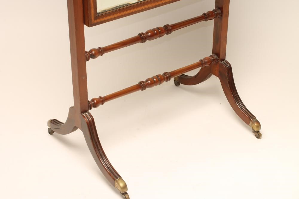 AN EDWARDIAN MAHOGANY CHEVAL MIRROR Image