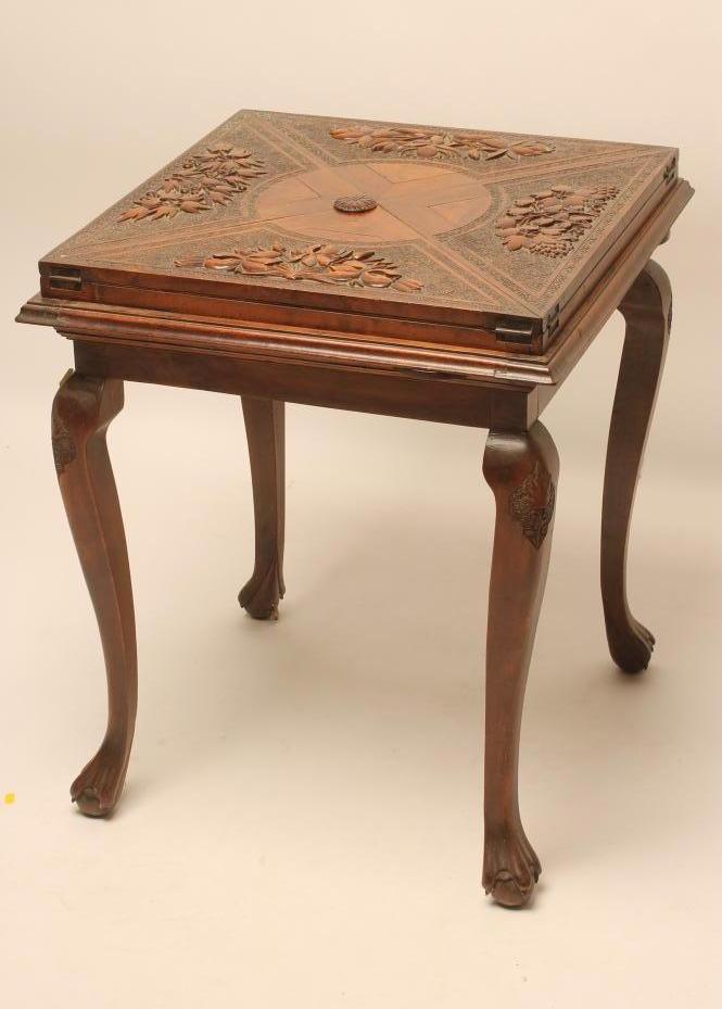 AN ANGLO INDIAN CARVED HARDWOOD ENVELOPE CARD TABLE Image