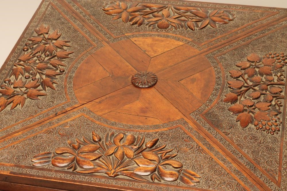 AN ANGLO INDIAN CARVED HARDWOOD ENVELOPE CARD TABLE Image