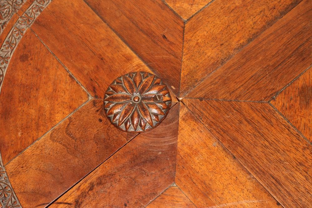 AN ANGLO INDIAN CARVED HARDWOOD ENVELOPE CARD TABLE Image