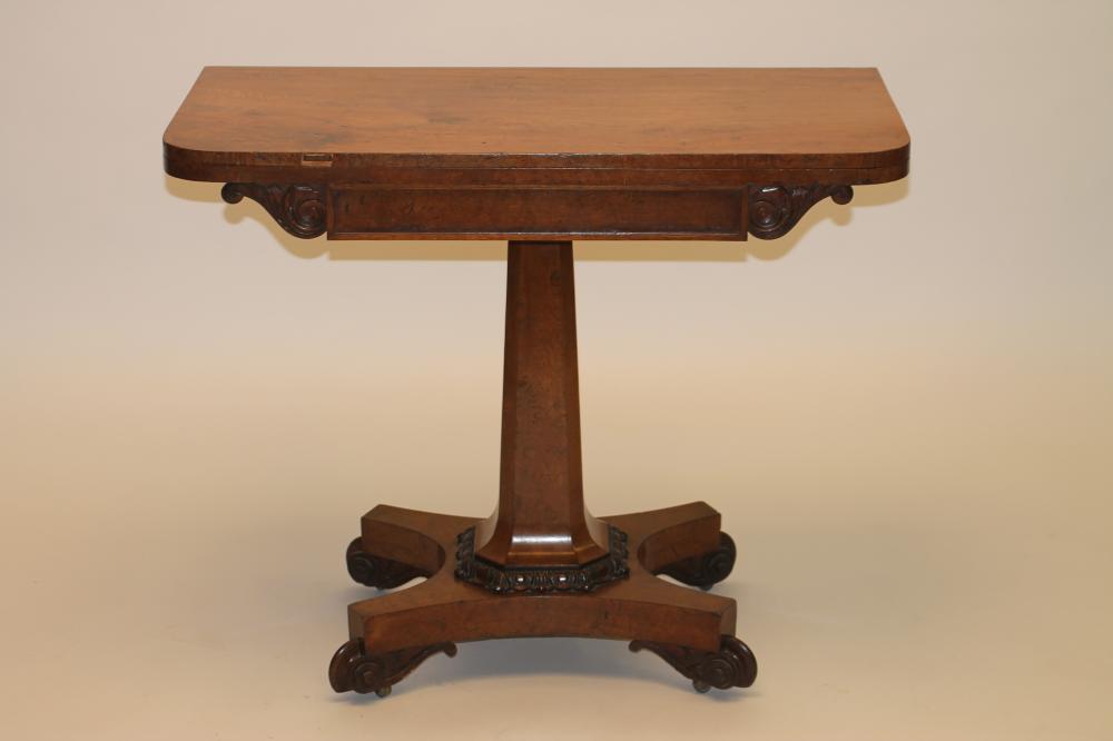 AN EARLY VICTORIAN POLLARD OAK FOLDING CARD TABLE of rounded oblong form Image