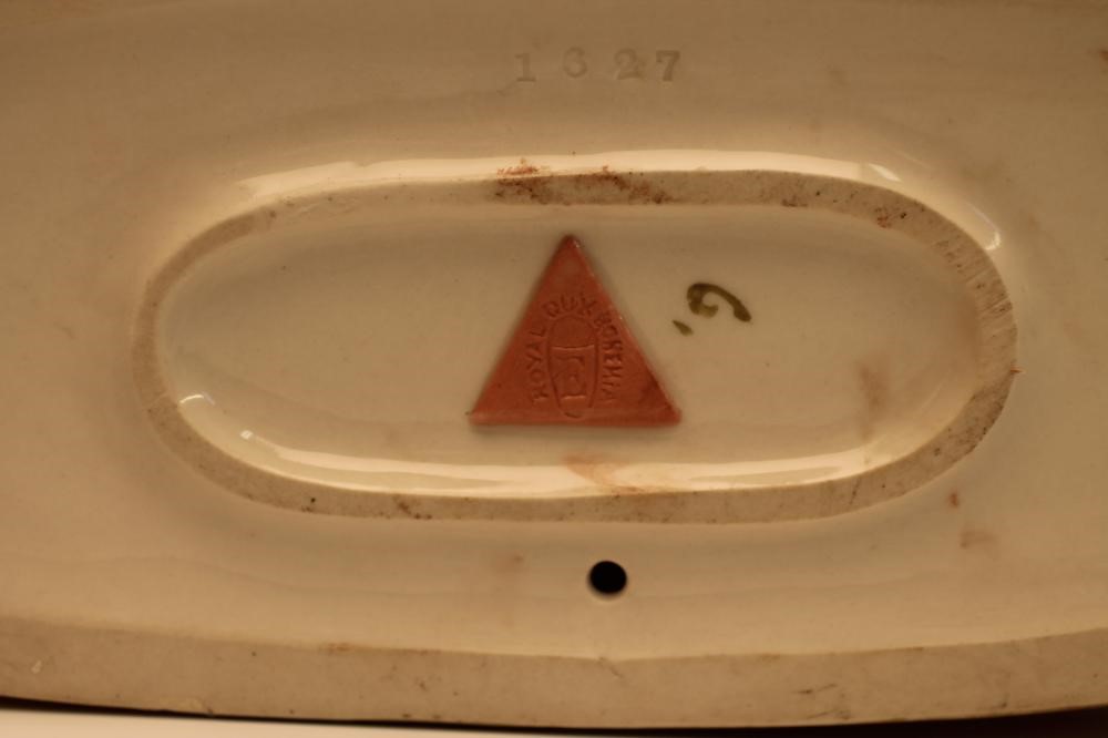 A ROYAL DUX BISQUE PORCELAIN MODEL Image