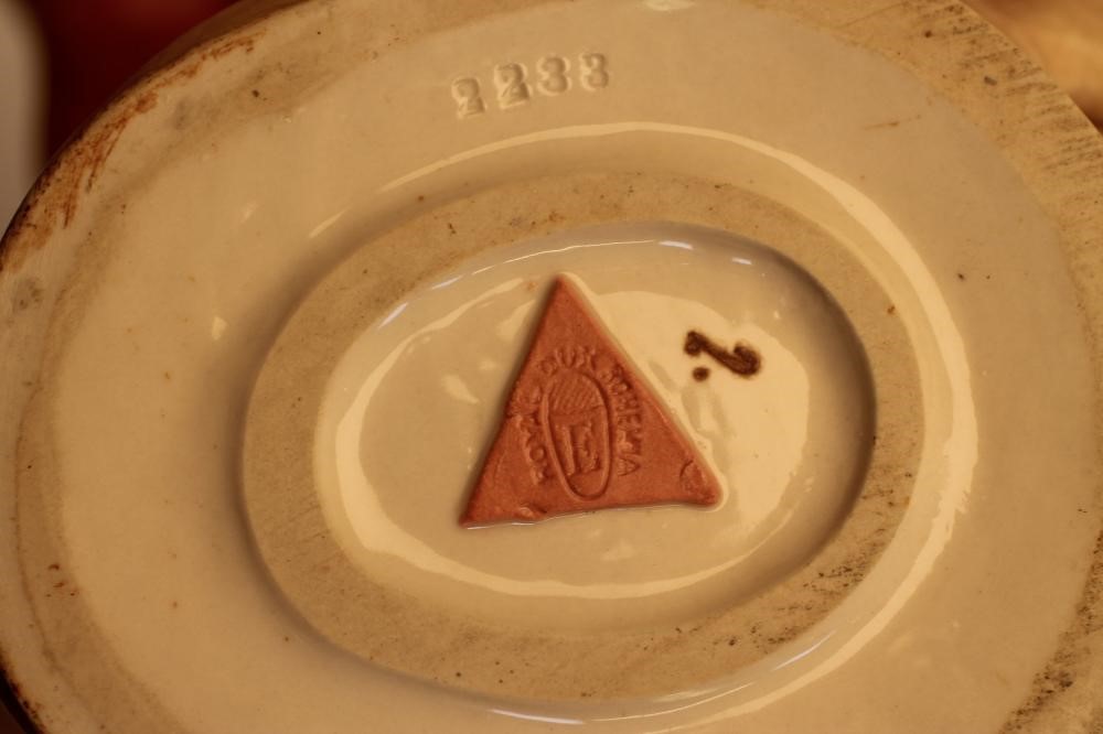 AN ART NOUVEAU ROYAL DUX BISQUE PORCELAIN FIGURAL CENTREPIECE modelled as a maiden playing a flute Image