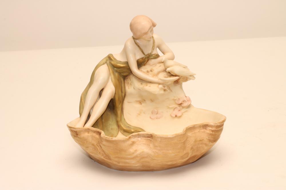 AN ART NOUVEAU ROYAL DUX BISQUE PORCELAIN FIGURAL SMALL CENTREPIECE modelled as a young scantily Image