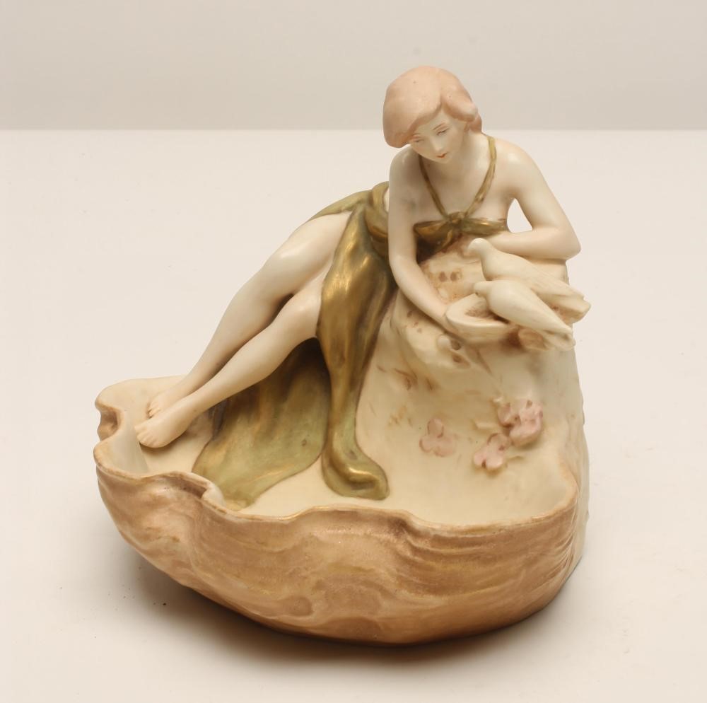 AN ART NOUVEAU ROYAL DUX BISQUE PORCELAIN FIGURAL SMALL CENTREPIECE modelled as a young scantily Image