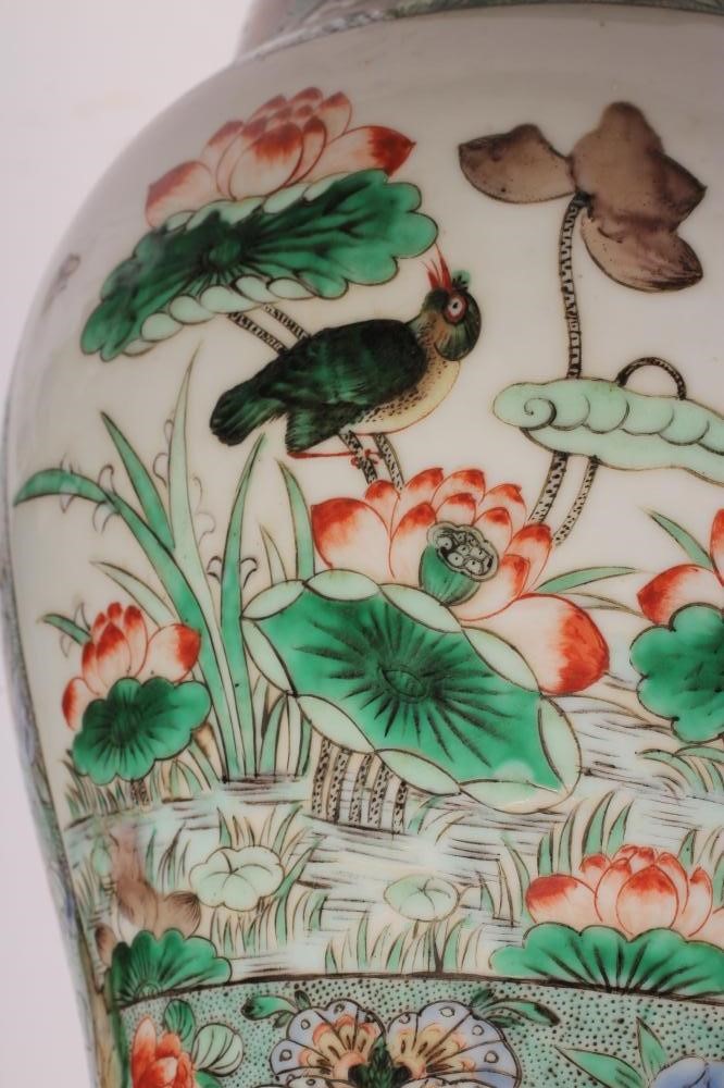 A CHINESE PORCELAIN YEN-YEN VASE painted in famille verte enamels with panels of birds amidst Image