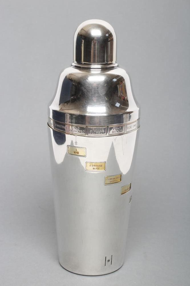 AN ART DECO EPNS RECIPE COCKTAIL SHAKER of flared cylindrical form with lift-off domed cover Image