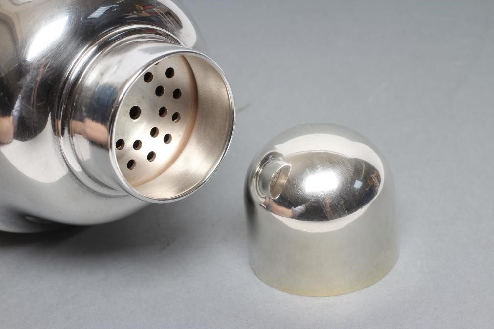 AN ART DECO EPNS RECIPE COCKTAIL SHAKER of flared cylindrical form with lift-off domed cover Image