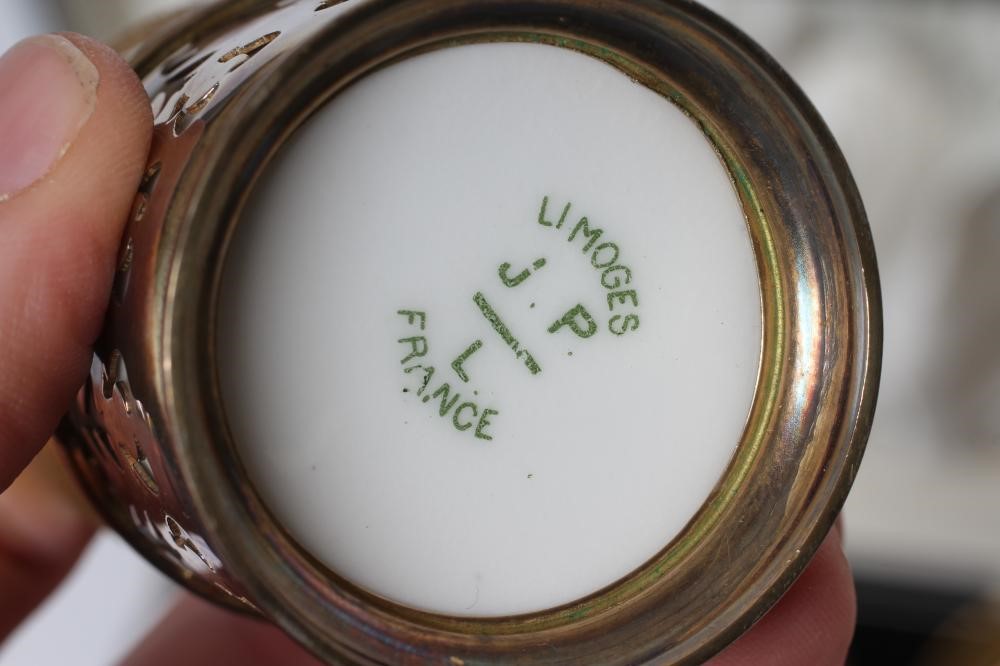 A SET OF SIX J. POUYAT LIMOGES PORCELAIN CANS AND SAUCERS with raised and burnished foliate gilded Image