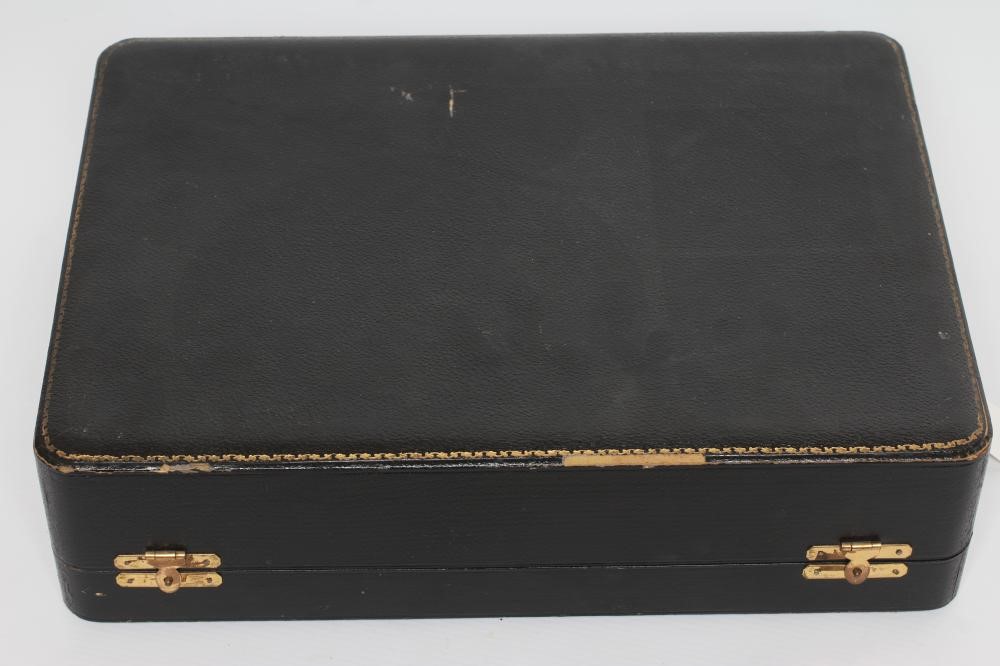 A SET OF SIX J. POUYAT LIMOGES PORCELAIN CANS AND SAUCERS with raised and burnished foliate gilded Image