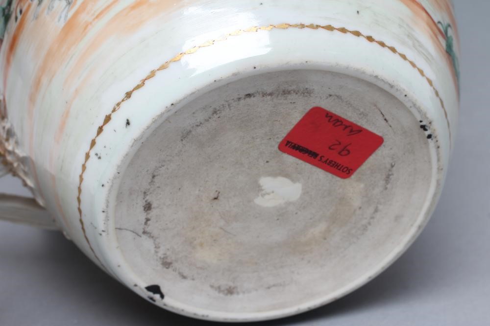 A CHINESE ARMORIAL PORCELAIN LARGE BARREL JUG Image