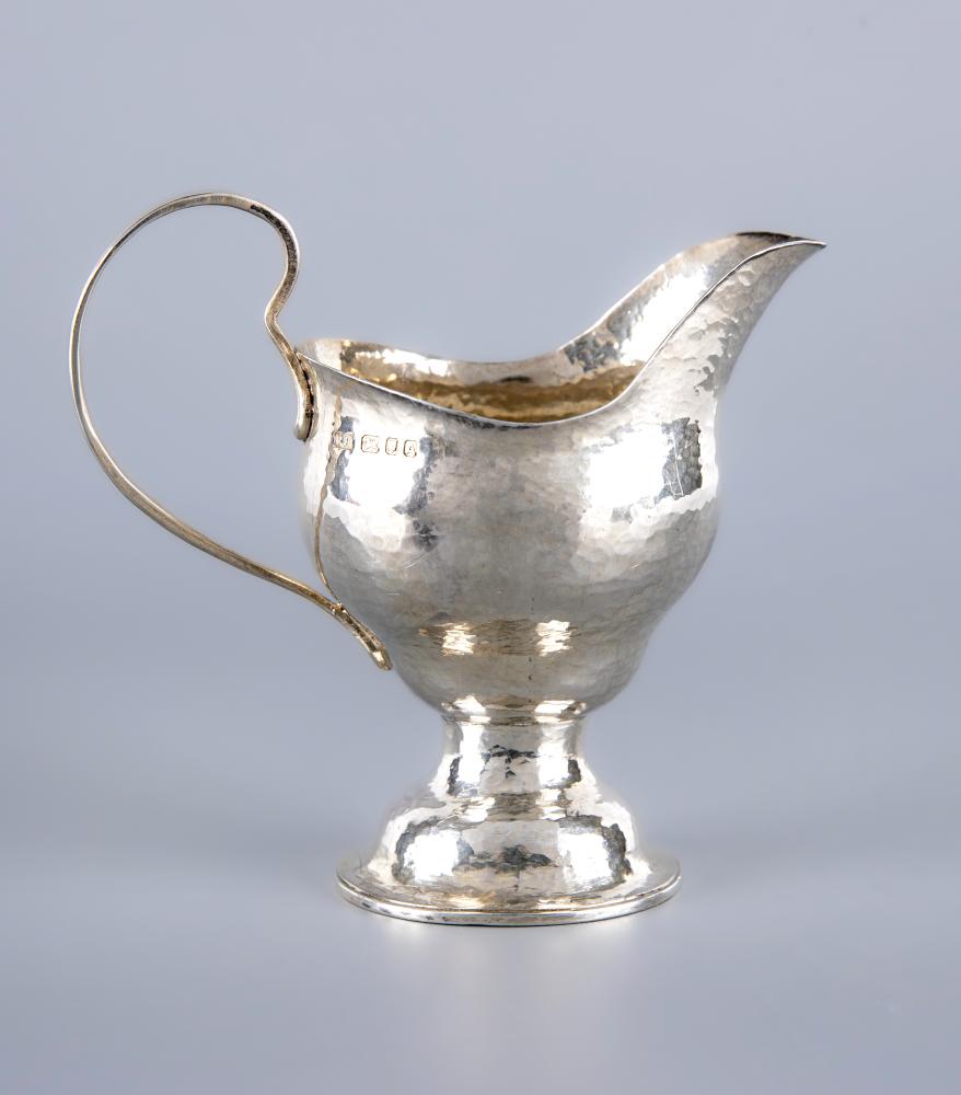 AN ARTS AND CRAFTS SILVER JUG Image