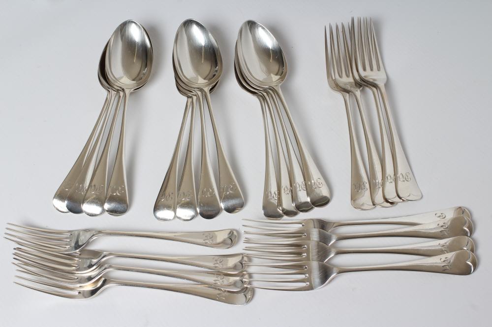 A SET OF TWELVE SILVER DESSERT SPOONS AND FORKS Image