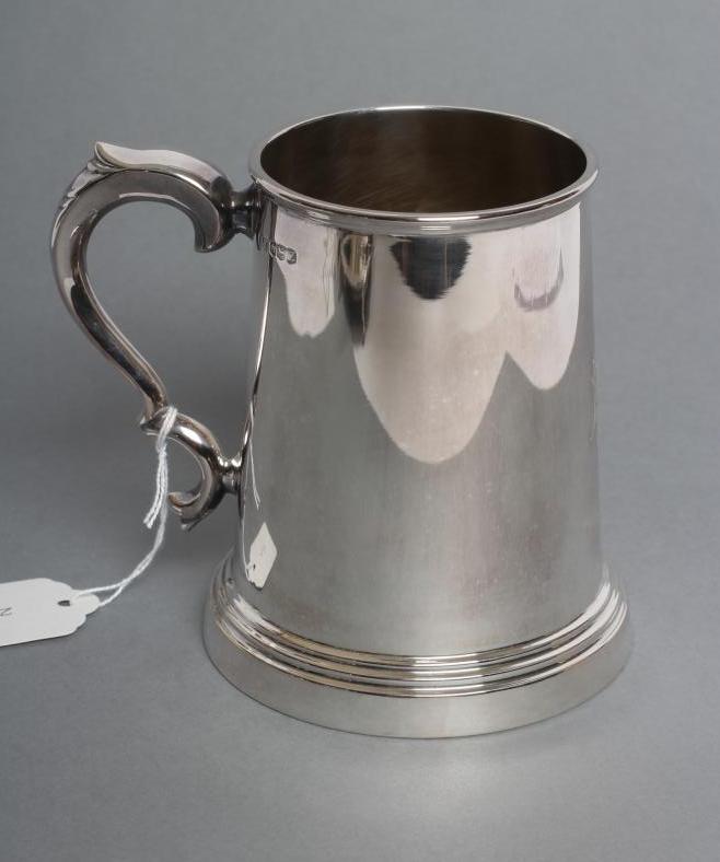 A SILVER MUG Image