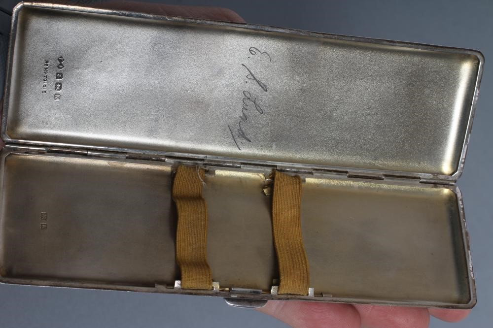 AN ART DECO SILVER DOUBLE CIGARETTE CASE Image