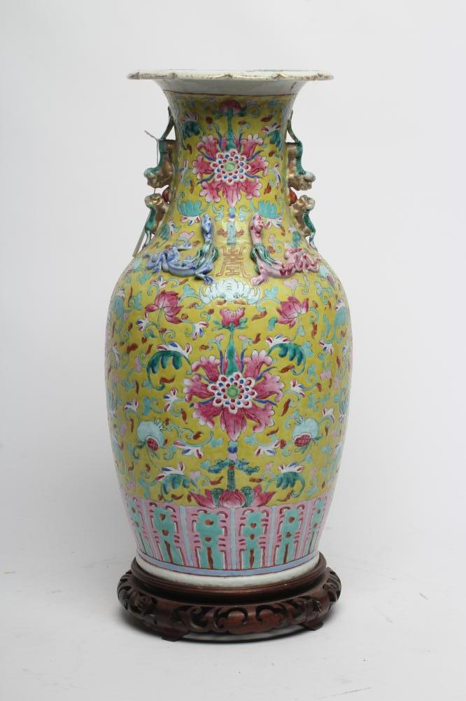 A CHINESE PORCELAIN VASE of baluster form with everted shaped rim and two shi-shi handles Image