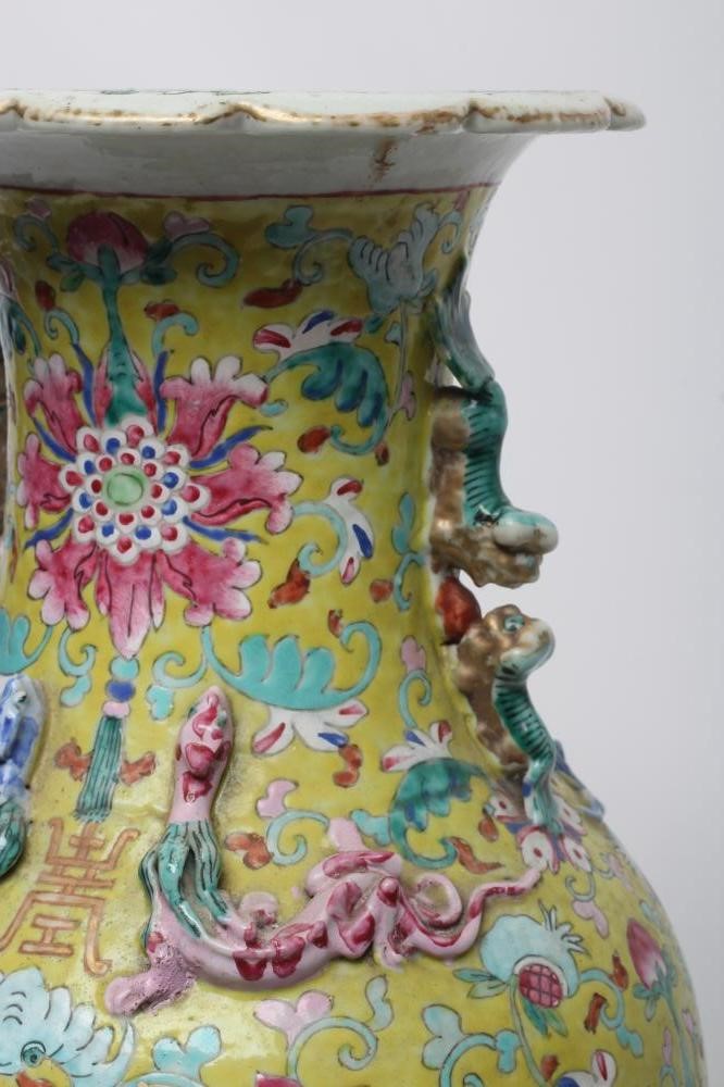 A CHINESE PORCELAIN VASE of baluster form with everted shaped rim and two shi-shi handles Image