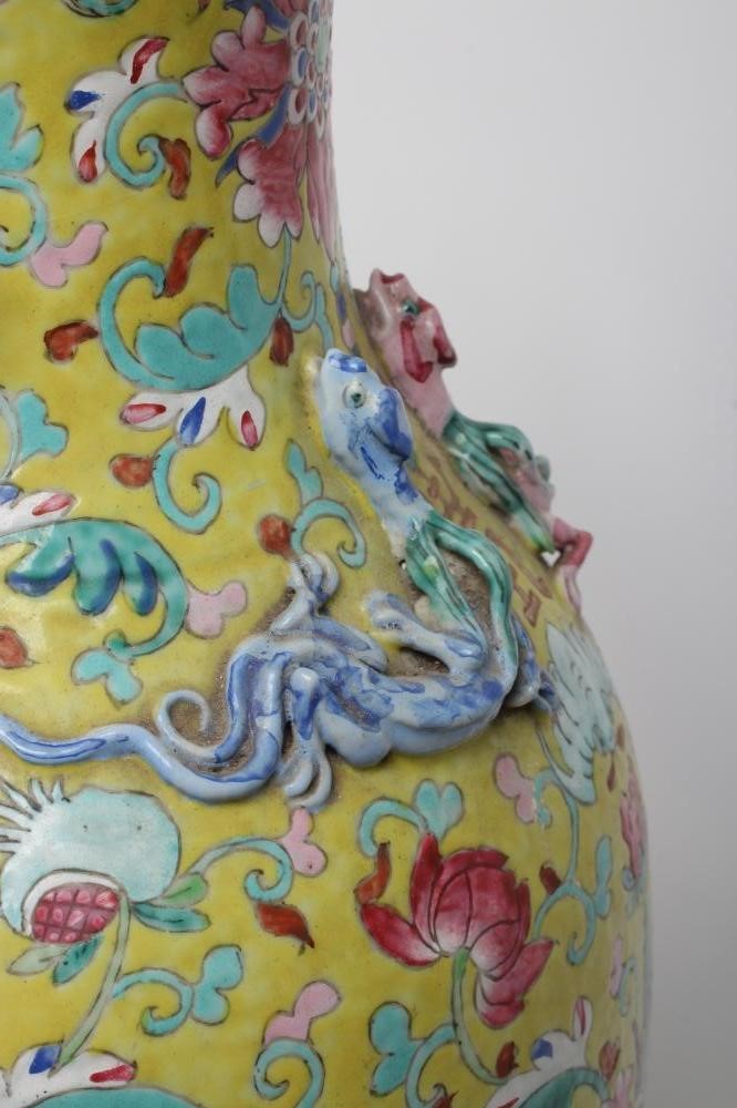 A CHINESE PORCELAIN VASE of baluster form with everted shaped rim and two shi-shi handles Image