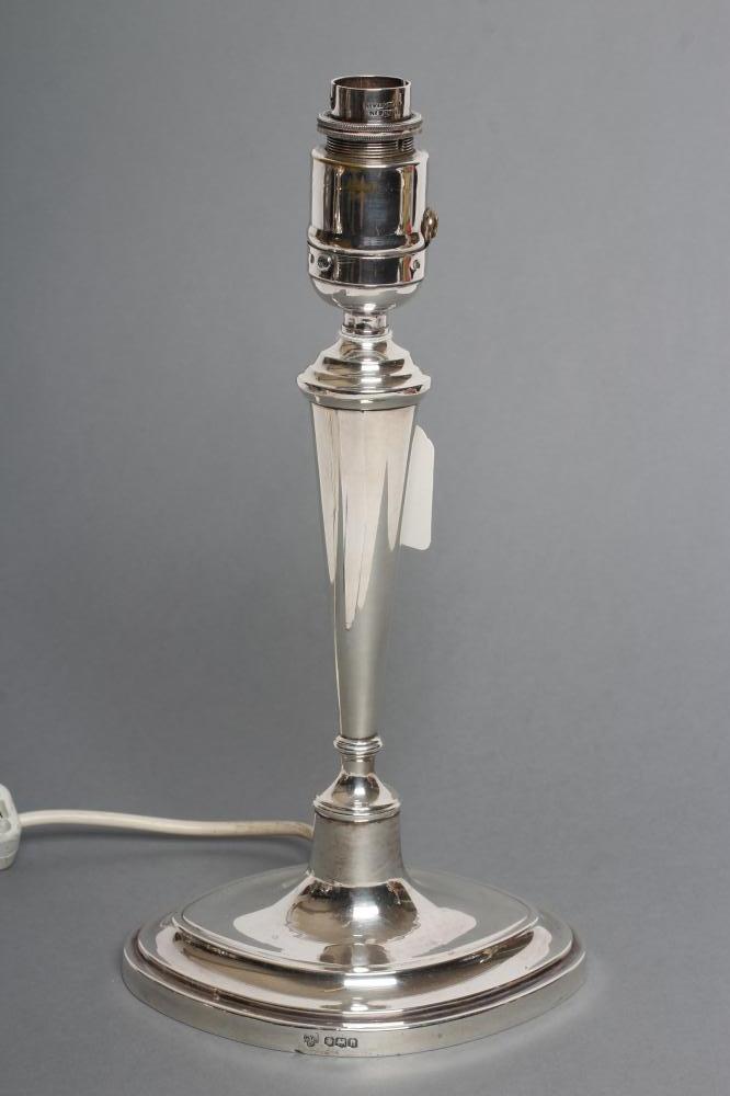 A SILVER ELECTRIC TABLE LAMP BASE Image