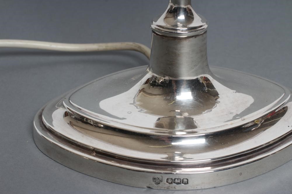 A SILVER ELECTRIC TABLE LAMP BASE Image