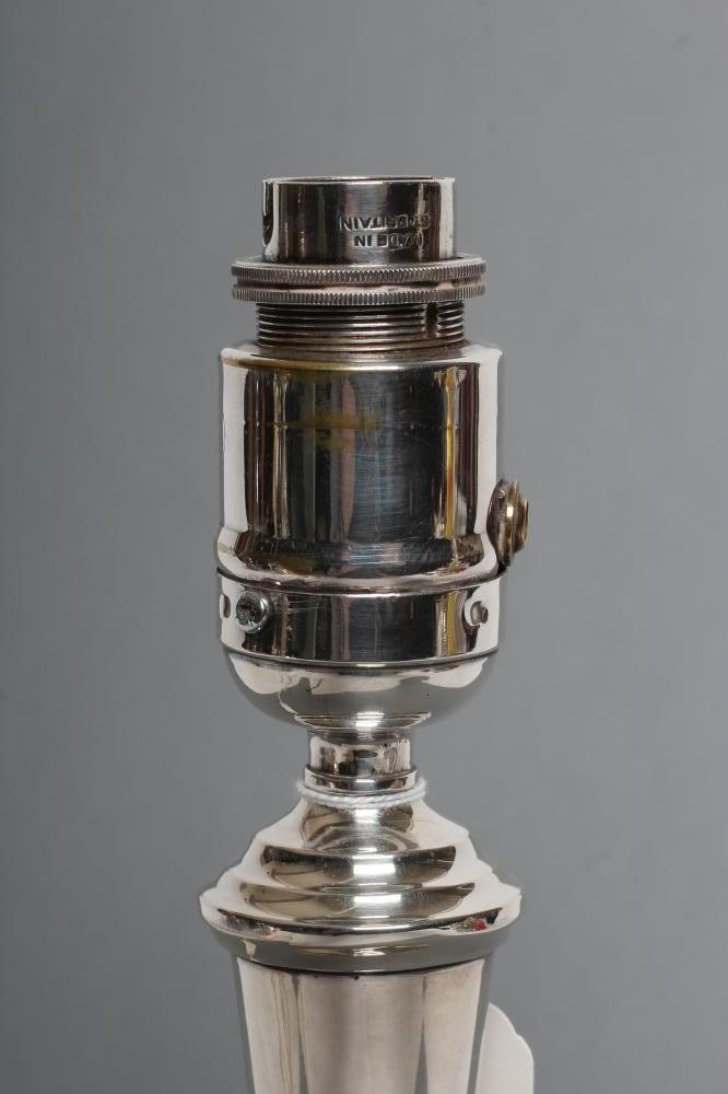 A SILVER ELECTRIC TABLE LAMP BASE Image