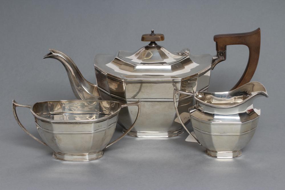 A SILVER THREE PIECE TEA SERVICE Image