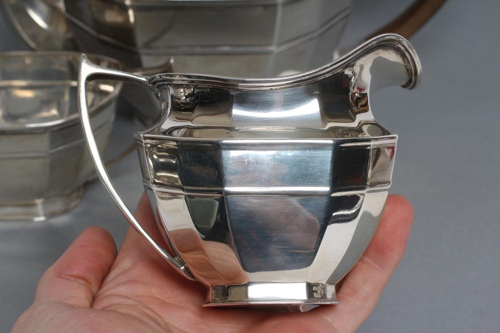 A SILVER THREE PIECE TEA SERVICE Image