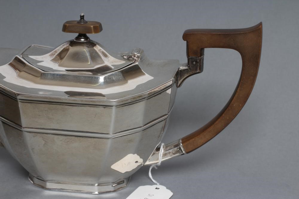 A SILVER THREE PIECE TEA SERVICE Image