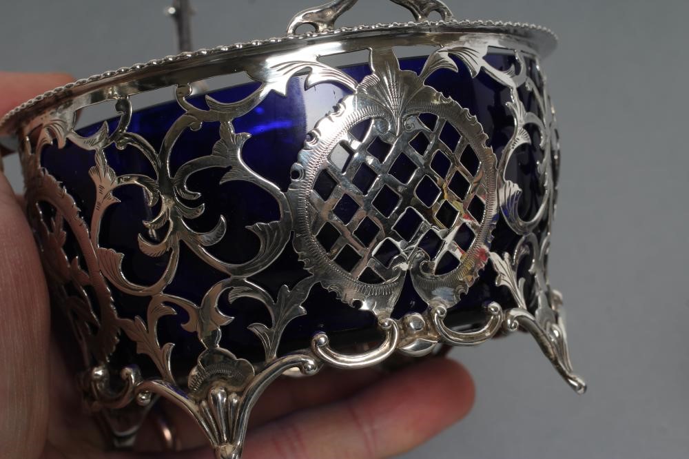 A MATCHED PAIR OF SILVER SWEETMEAT BASKETS Image