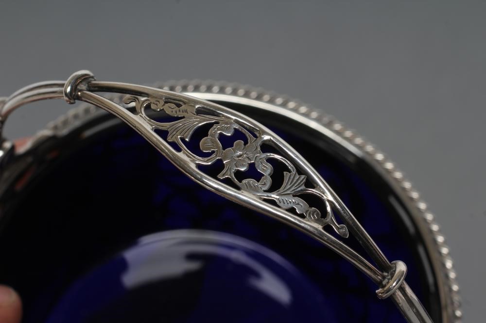 A MATCHED PAIR OF SILVER SWEETMEAT BASKETS Image