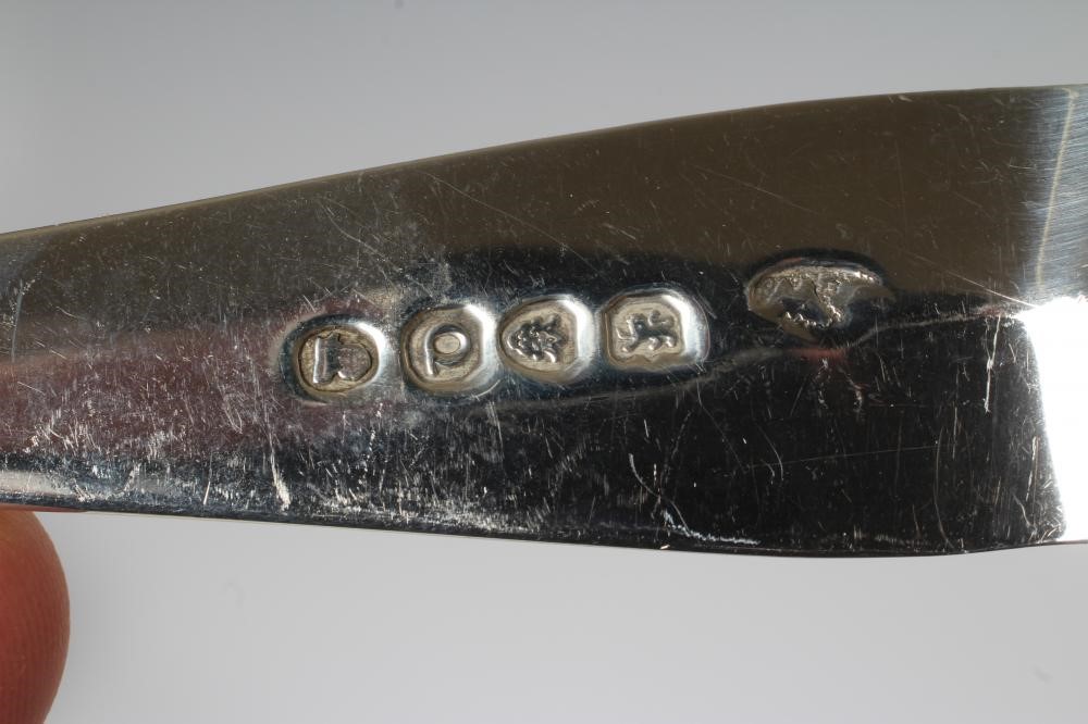 A COLLECTION OF SILVER FLATWARE comprising twelve teaspoons Image